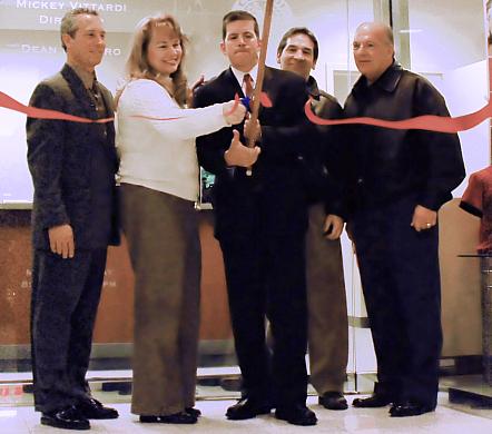 Mayor Dean DePiero, Recreation Director Mickey Vittardi, and members of Parma City Council cut the ribbon at the new Parks and Recreation offices located at Parmatown Mall.